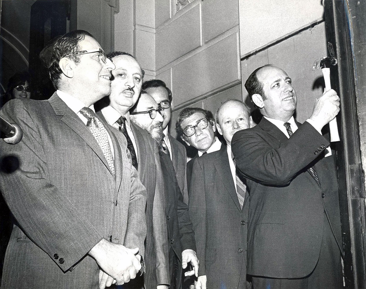 Dr Lander with colleagues at opening of new building