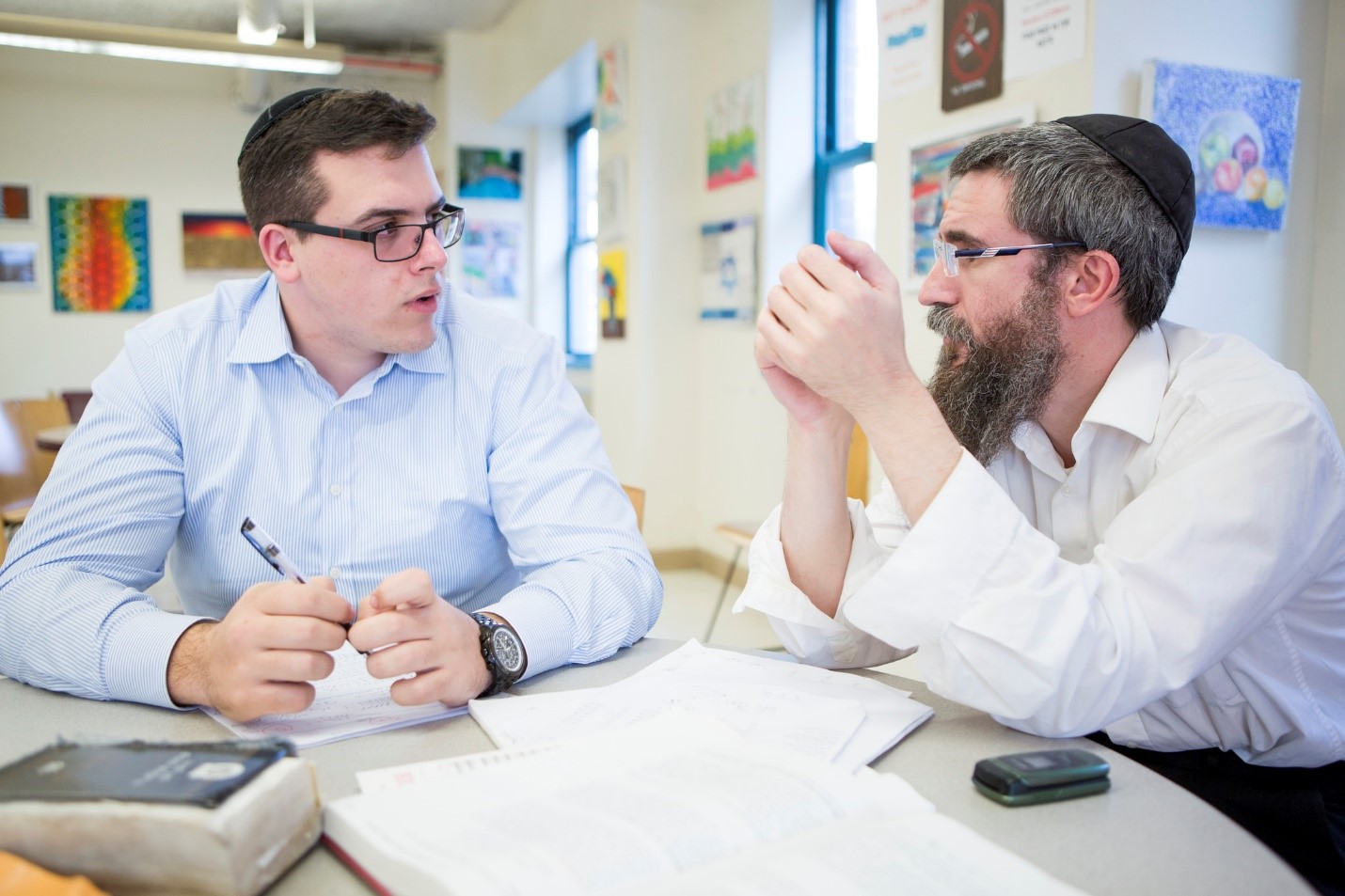 Joe Roth (left) in a session with his statistics tutor.