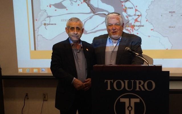 Dr. Mordechai Kedar, left, with Professor Alan Mond, right, at the former’s October 11 dialogue on “The Three I’s” at the Lander College of Arts and Sciences in Flatbush.