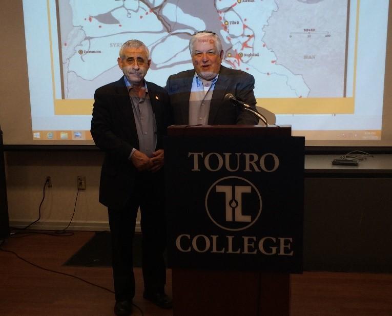 Dr. Mordechai Kedar, left, with Professor Alan Mond, right, at the former’s October 11 dialogue on “The Three I’s” at the Lander College of Arts and Sciences in Flatbush.